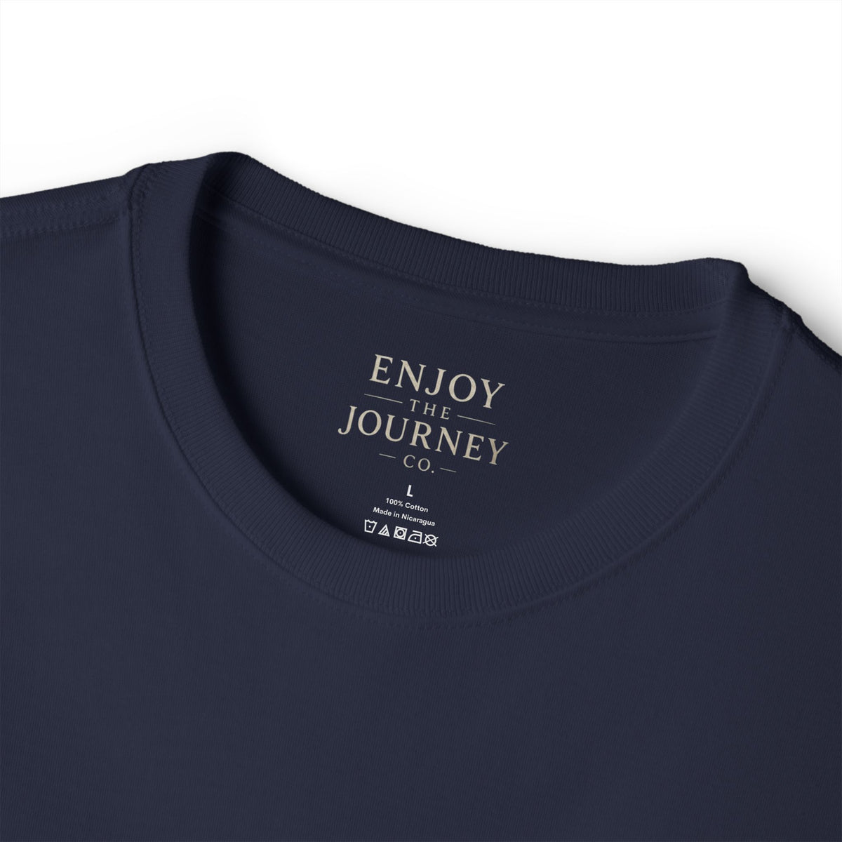 Feather Minimalist Tee — "Enjoy the Journey" Chest Graphic
