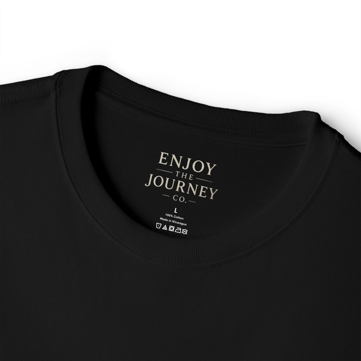 Feather Minimalist Tee — "Enjoy the Journey" Chest Graphic