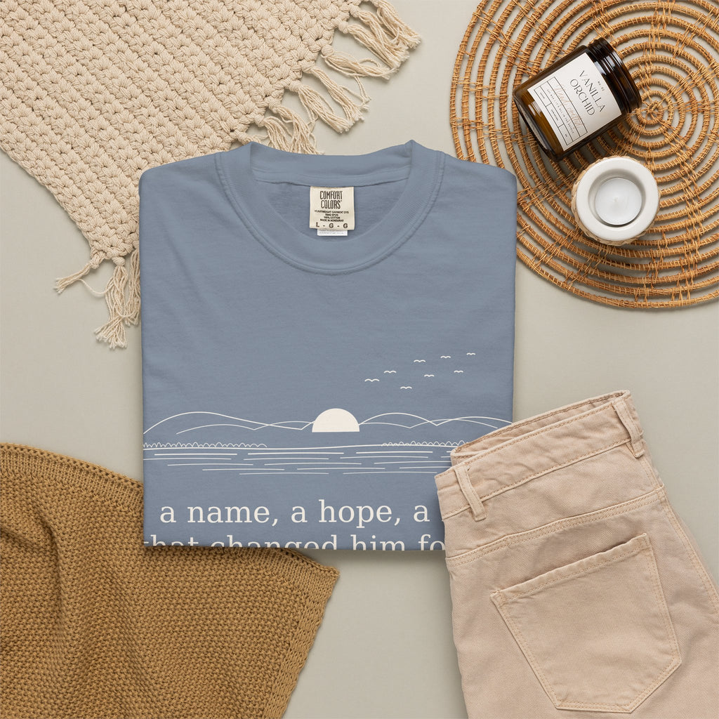 Literary Quote Sunset T-Shirt — "a name, a hope, a Love that changed him forever."