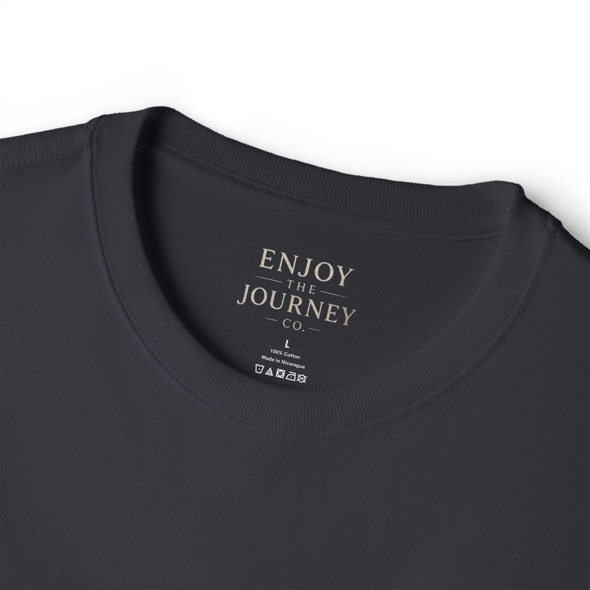 Feather Minimalist Tee — "Enjoy the Journey" Chest Graphic