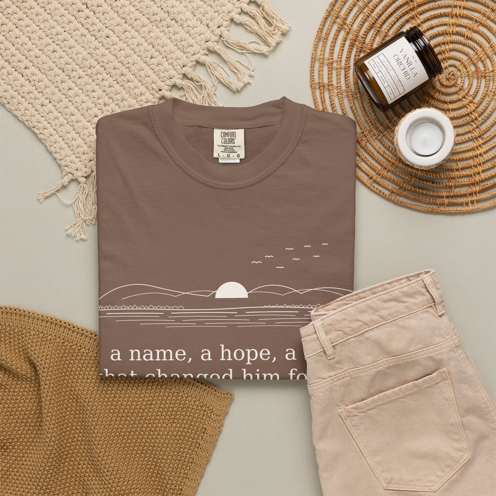Literary Quote Sunset T-Shirt — "a name, a hope, a Love that changed him forever."